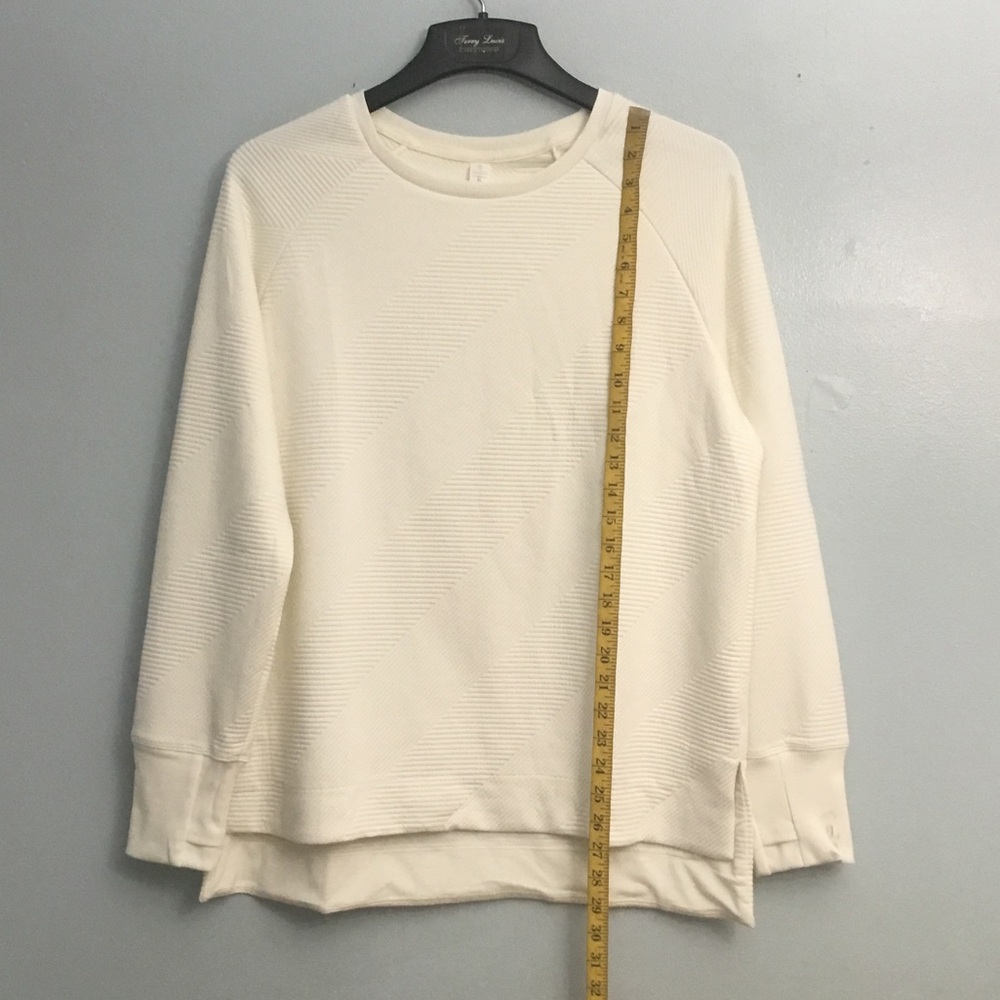BALANCE CONNECTION SWEATER.